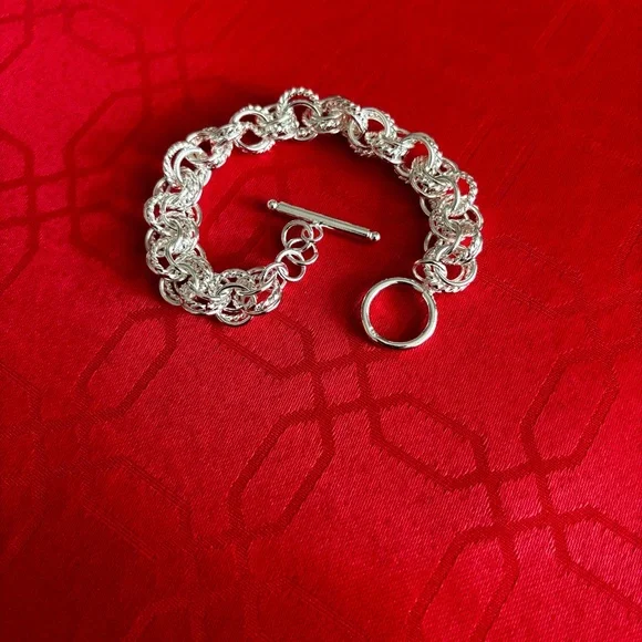 NEW 925 STERLING SILVER INTERWOVEN CIRCLES
BRACELET WITH TOGGLE CLASP  … - Picture 4 of 7